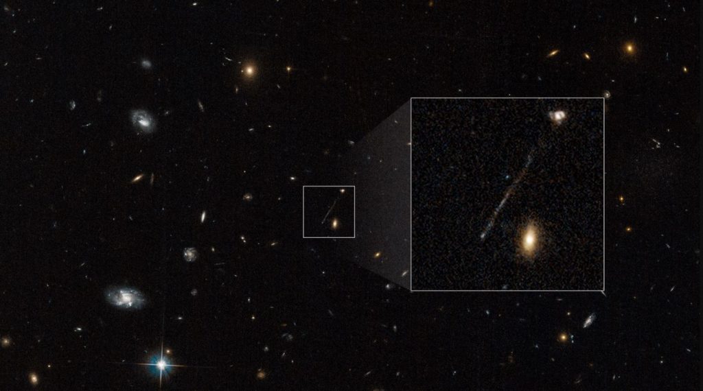 Hubble trpu noir trainée d'étoiles
